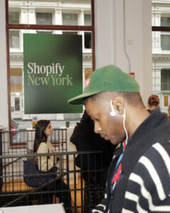 Shopify Meetup NYC: Own Your Margin, Own Your Destiny 11 Shopify Founder checking out the in-venue retail store featuring Made in New York brands